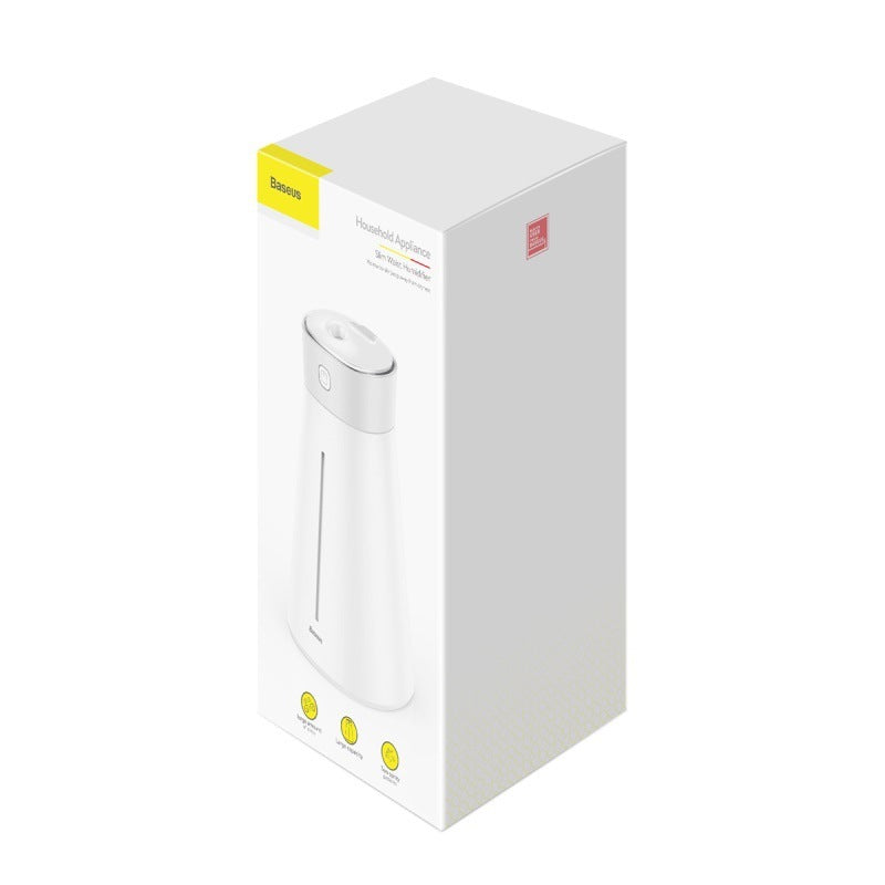 Baseus USB humidifier in white, 2.6L capacity, quiet operation at 36dB, compact desktop air moisturizer.