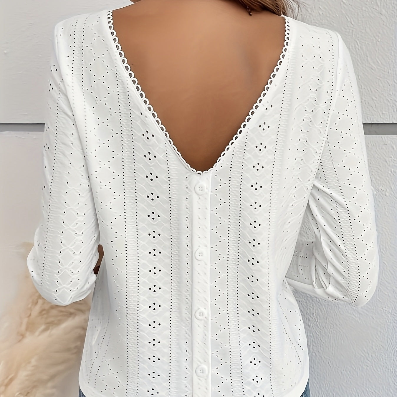 White women's t-shirt with eyelet embroidery and button-back detail by Alabaster