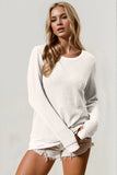 White long sleeve tee with thumbhole cuffs, soft cotton material, perfect for casual layering by Double Take.