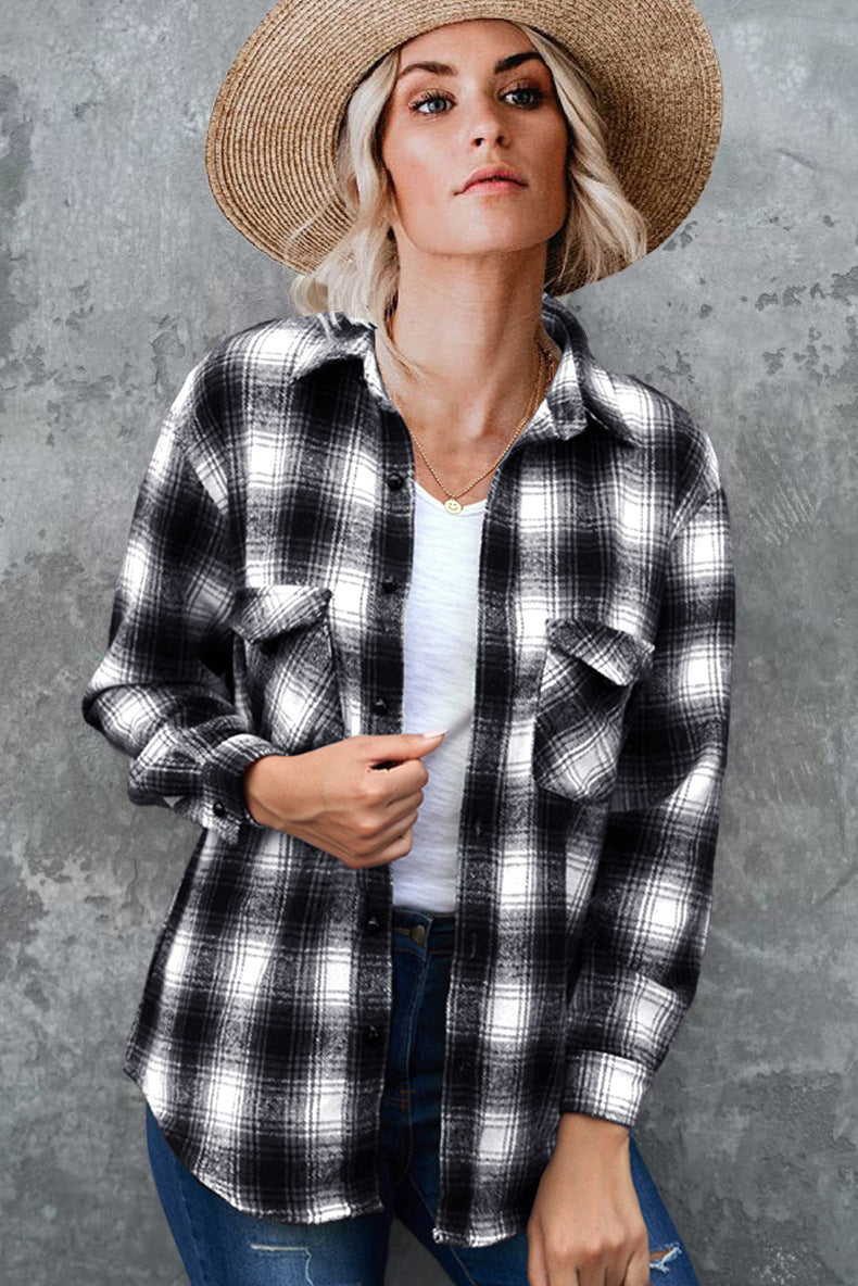 Plaid mid-length shirt jacket in black by Alabaster, perfect for casual fall layering.