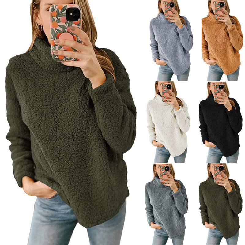 Light gray thick polar fleece turtleneck pullover by Alabaster, featuring a high collar for winter comfort.