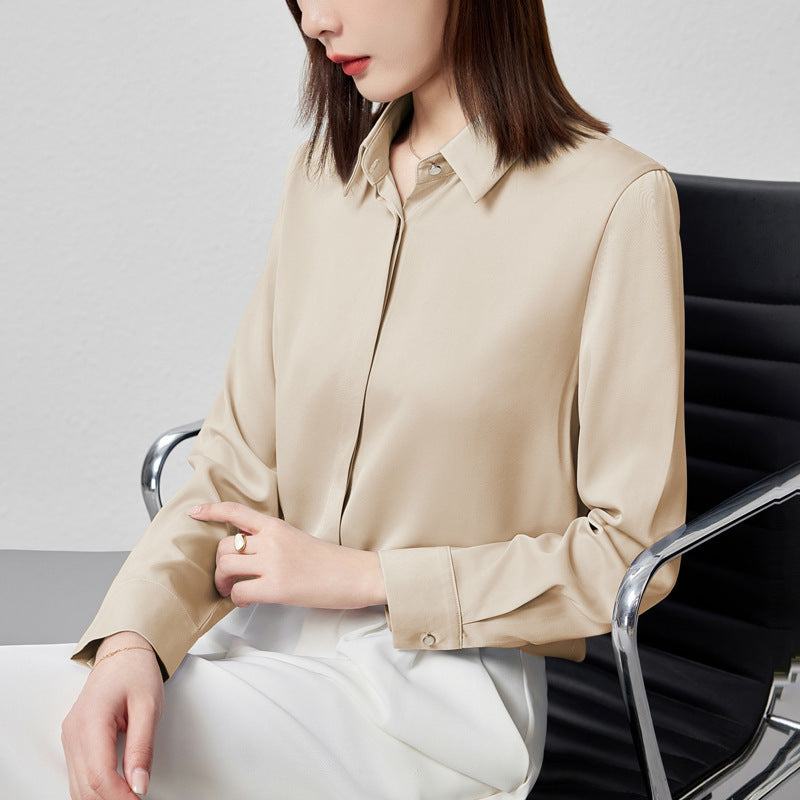 White satin long sleeve blouse with button front by Alabaster, suitable for office wear