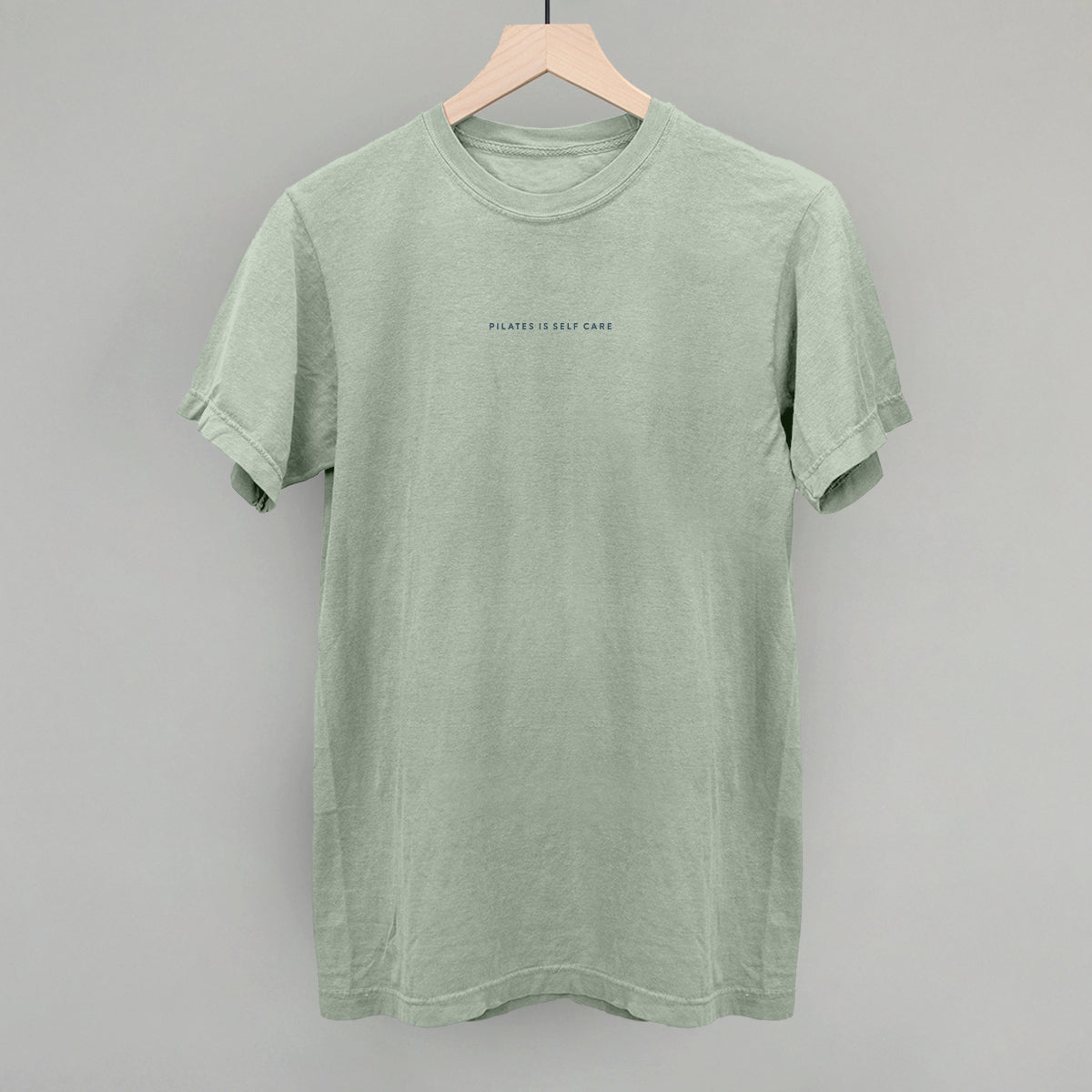 Light blue cotton tee from Ivy + Cloth's Pilates Is Self Care Collection, perfect for cozy athleisure wear.
