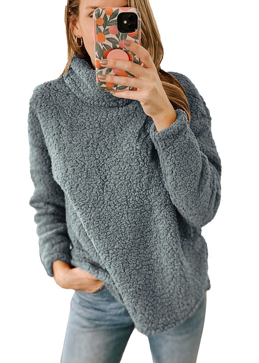 Light gray thick polar fleece turtleneck pullover by Alabaster, featuring a high collar for winter comfort.