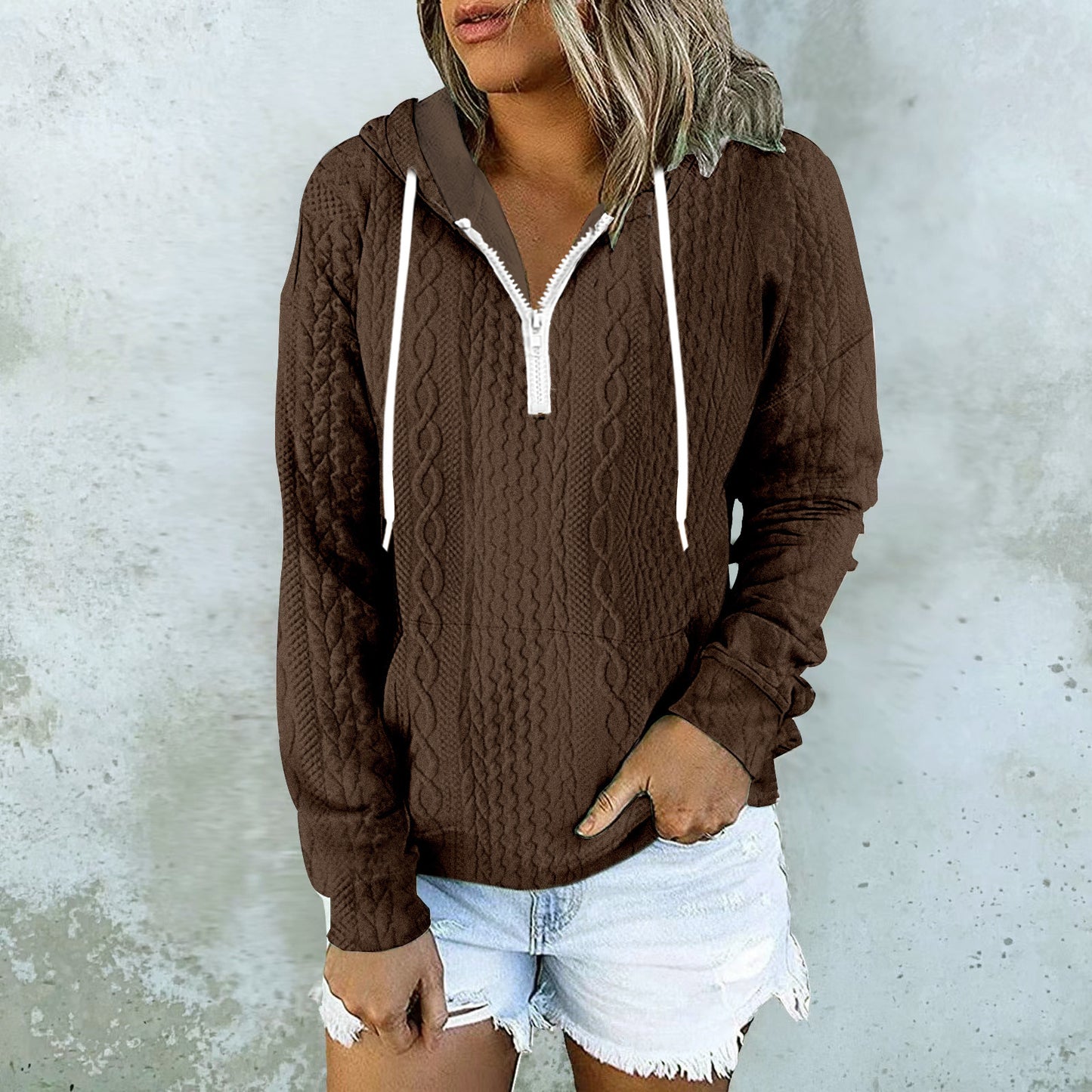 White cable knit zip-up hoodie with drawstring hood for women by Alabaster