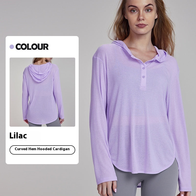 Kaki brown hooded long sleeve yoga top with curved hem and button-front by Alabaster, made for breathable comfort.