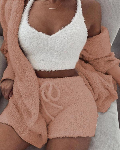 White velvet 3-piece pajama set by Alabaster, featuring a cozy cardigan and comfortable pants.