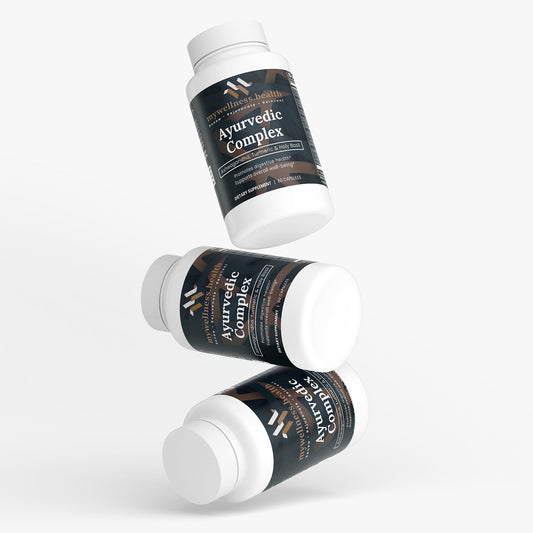 Green bottle of mywellness.health Ayurvedic Complex Supplement with ashwagandha, turmeric, and holy basil