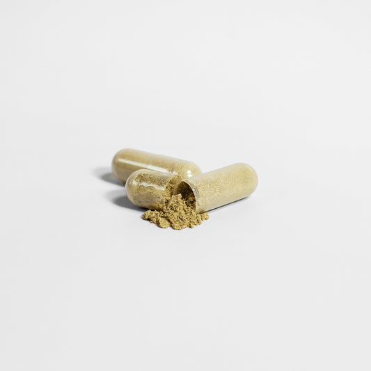 Green Moringa Pure Organic Leaf Capsules in a clear bottle by mywellness.health, allergen-free and detox supplement