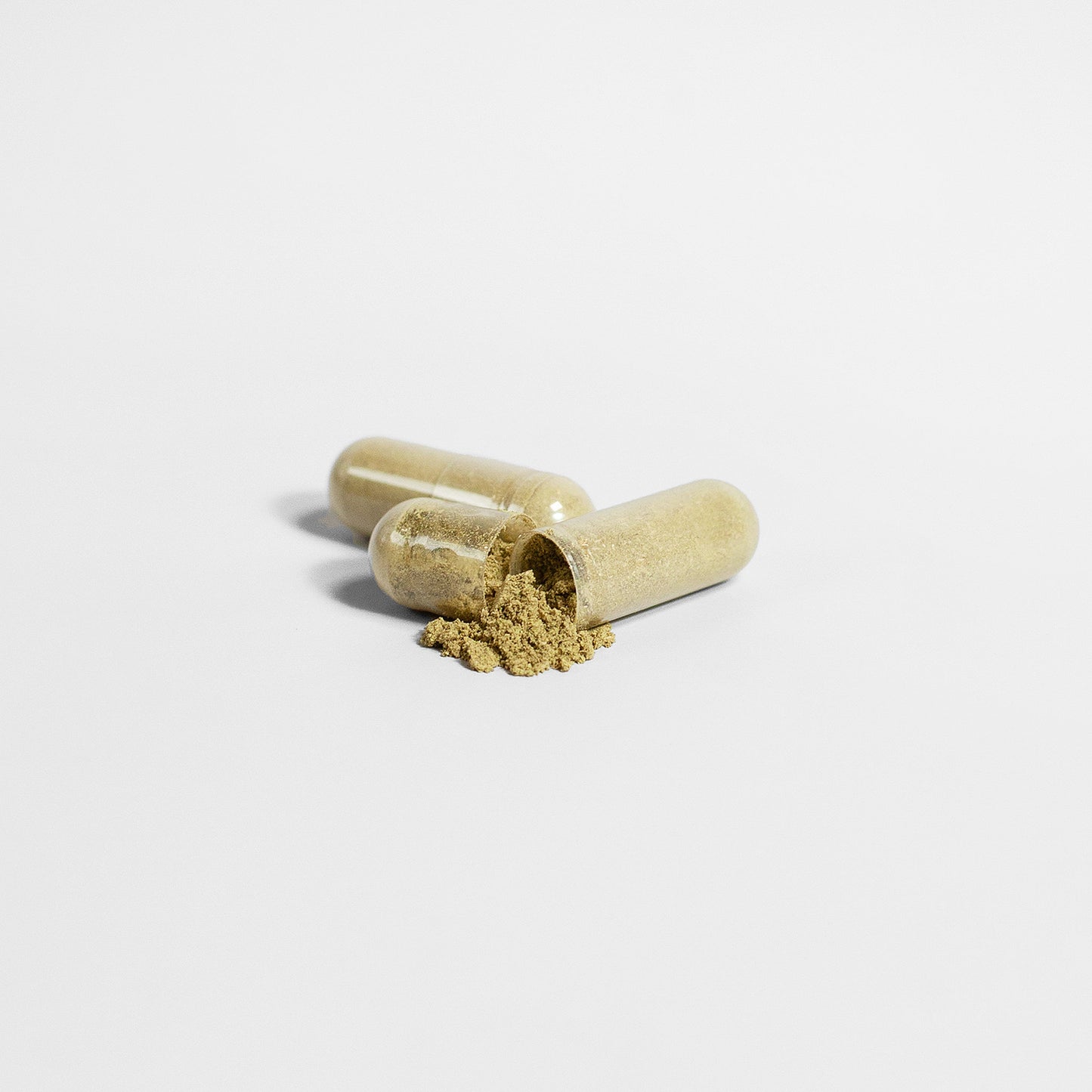 Green Moringa Pure Organic Leaf Capsules in a clear bottle by mywellness.health, allergen-free and natural supplement.
