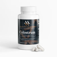 Natural colostrum capsules 500mg in a clear bottle, labeled for immune support by mywellness.health.