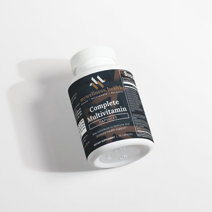 Green bottle of mywellness.health Complete Daily Multivitamin, plant-based, allergen-free, with B-complex vitamins