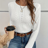 White women's t-shirt with eyelet embroidery and button-back detail by Alabaster