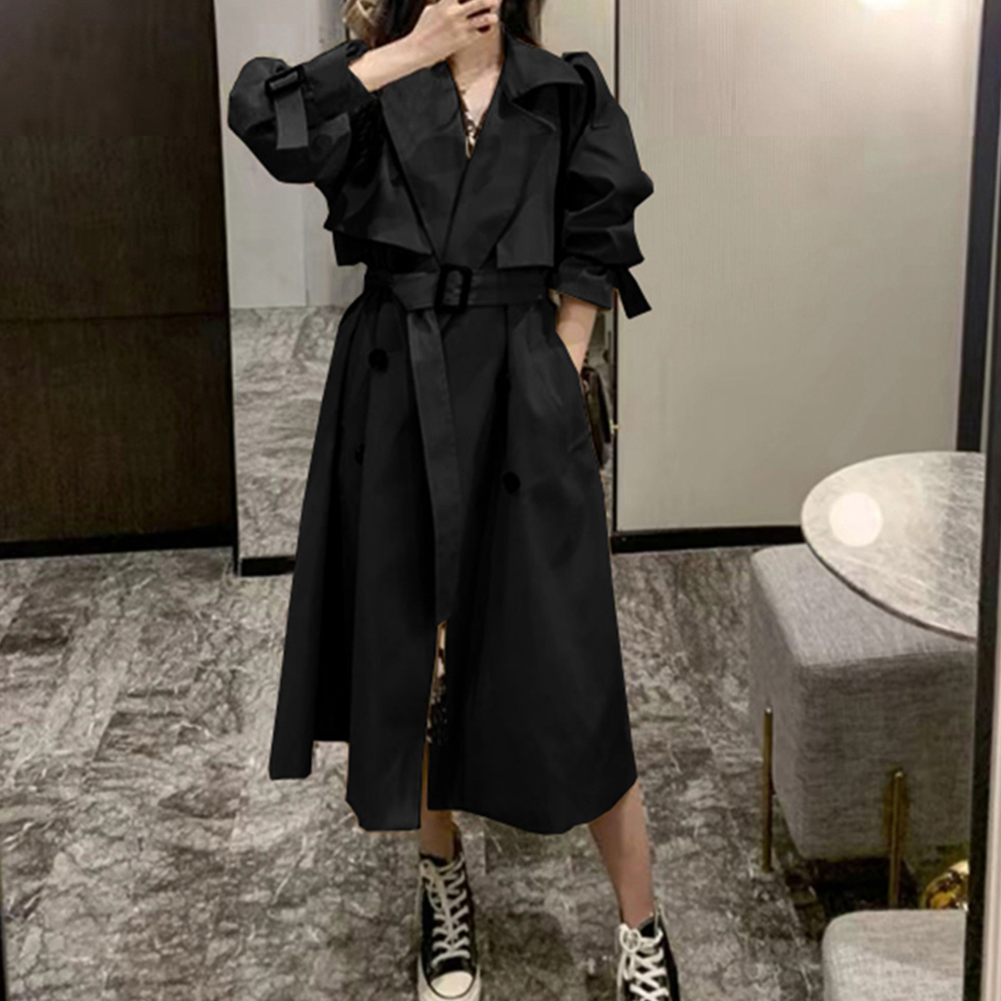 Gray green mid-length oversized trench coat by Alabaster with adjustable cuffs and double-breasted design