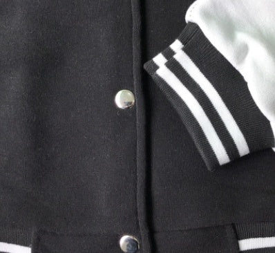 Black and white cotton blend varsity baseball jacket by My Store, featuring a two-tone design and athletic style.