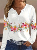 White long sleeve tee with rose print and button detail by Alabaster, perfect for autumn casual wear.