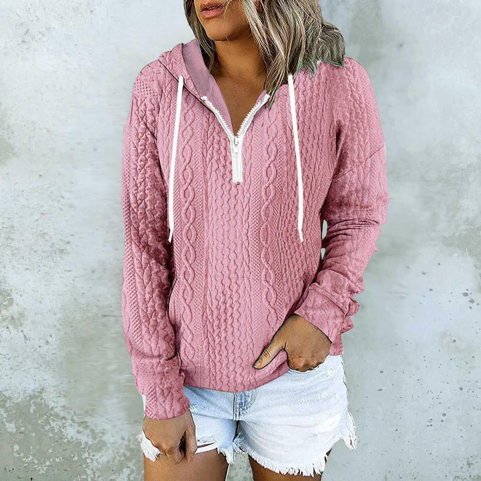 White cable knit zip-up hoodie with drawstring hood for women by Alabaster
