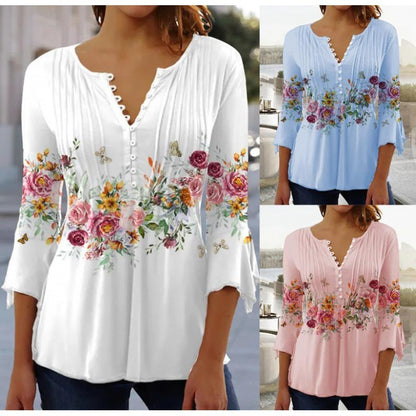 White floral V-neck pleated blouse with 3/4 sleeves and button front by Alabaster