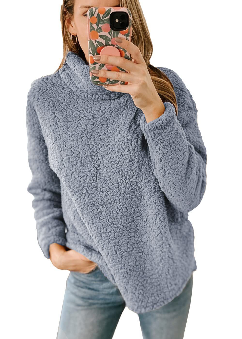 Light gray thick polar fleece turtleneck pullover by Alabaster, featuring a high collar for winter comfort.