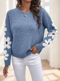 Blue polyester knit sweater with floral drop shoulder design by Alabaster