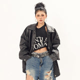 Black oversized punk moto PU leather jacket with button closure by Alabaster