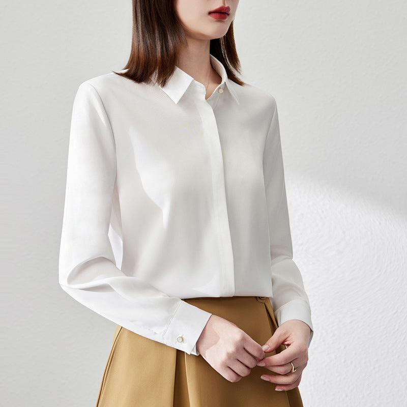 White satin long sleeve blouse with button front by Alabaster, suitable for office wear