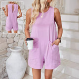 Alabaster army green cotton sleeveless jumpsuit with loose fit and side pockets