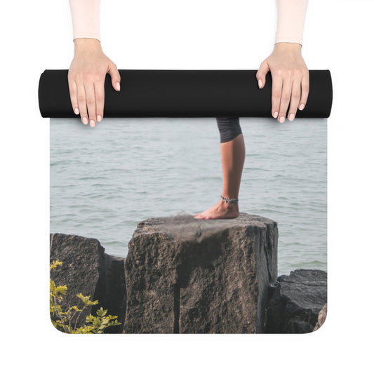 Eco-friendly Tranquility Yoga Mat in green with carry straps, measuring 24” x 70” by mywellness.health