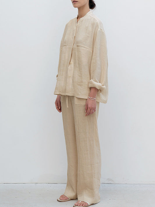 White pure linen pocket shirt by Alabaster, featuring a casual-elegant design in breathable fabric.