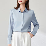 White satin button-down blouse for women by Alabaster, featuring a professional office style.