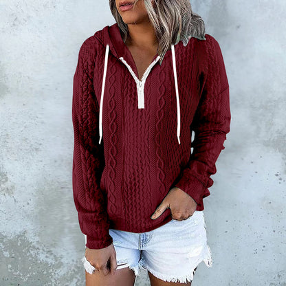 White cable knit zip-up hoodie with drawstring hood for women by Alabaster