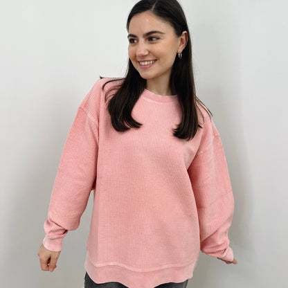 Blossom pink oversized corded crew neck sweatshirt by Ivy + Cloth, showcasing a cozy and casual style.