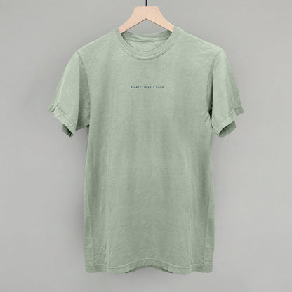 Light blue cotton tee from Ivy + Cloth's Pilates Is Self Care Collection, perfect for cozy athleisure wear.