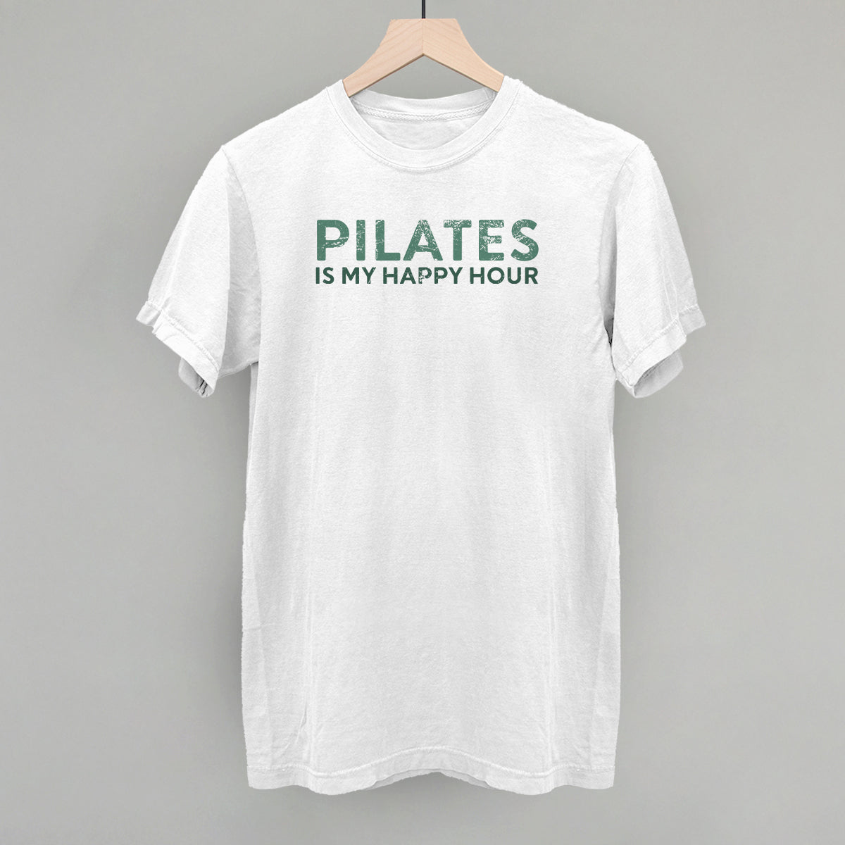 Bay Comfort Colors tee from Ivy + Cloth featuring 'Pilates Is My Happy Hour' slogan, perfect for casual fitness wear.
