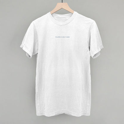 Light blue cotton tee from Ivy + Cloth, part of the Pilates Is Self Care Collection, available in sizes S, M, and L.