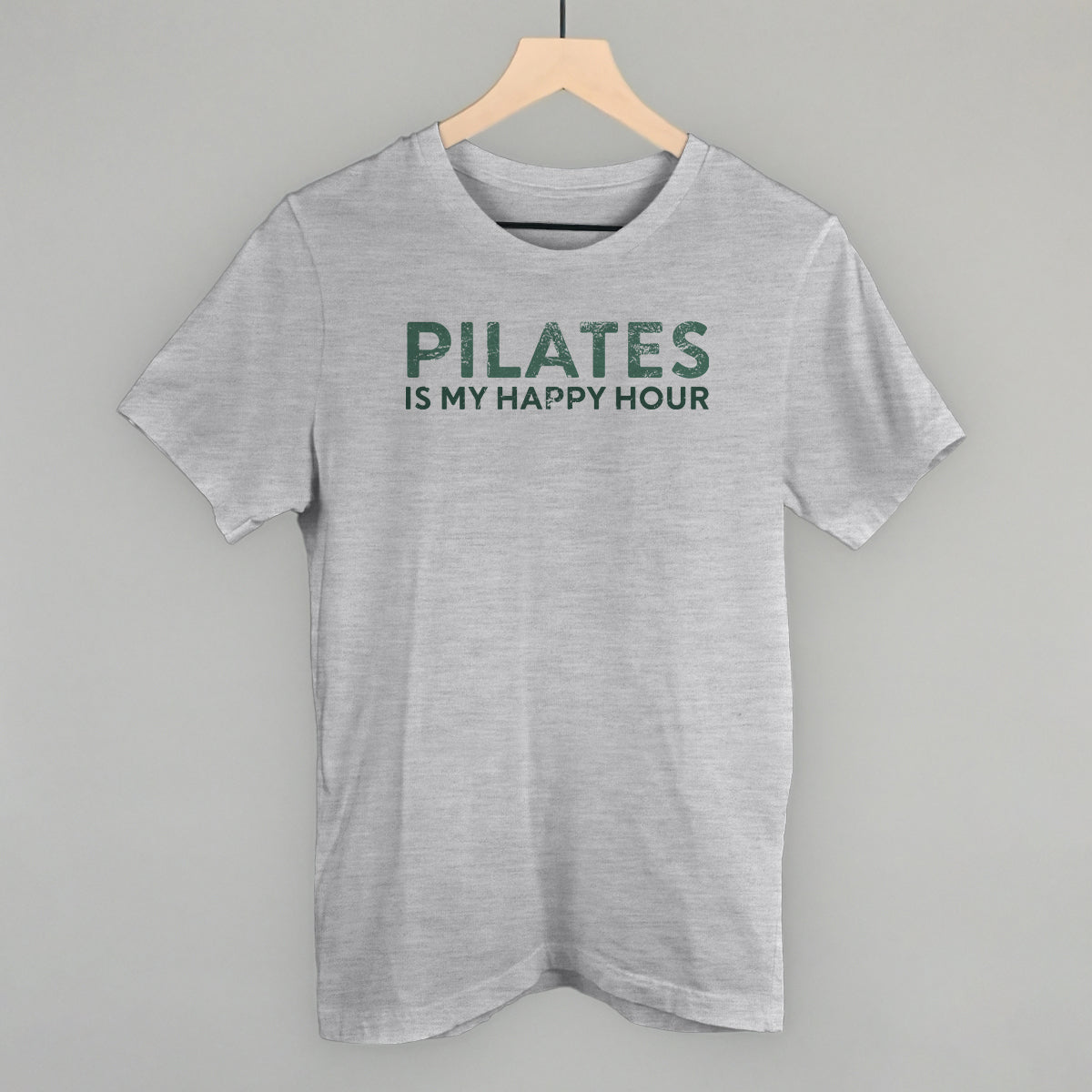 Bay Comfort Colors tee from Ivy + Cloth featuring 'Pilates Is My Happy Hour' graphic, perfect for casual fitness wear.