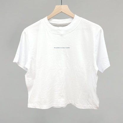 Light blue cotton tee from Ivy + Cloth's Pilates Is Self Care Collection, perfect for cozy athleisure and fitness.