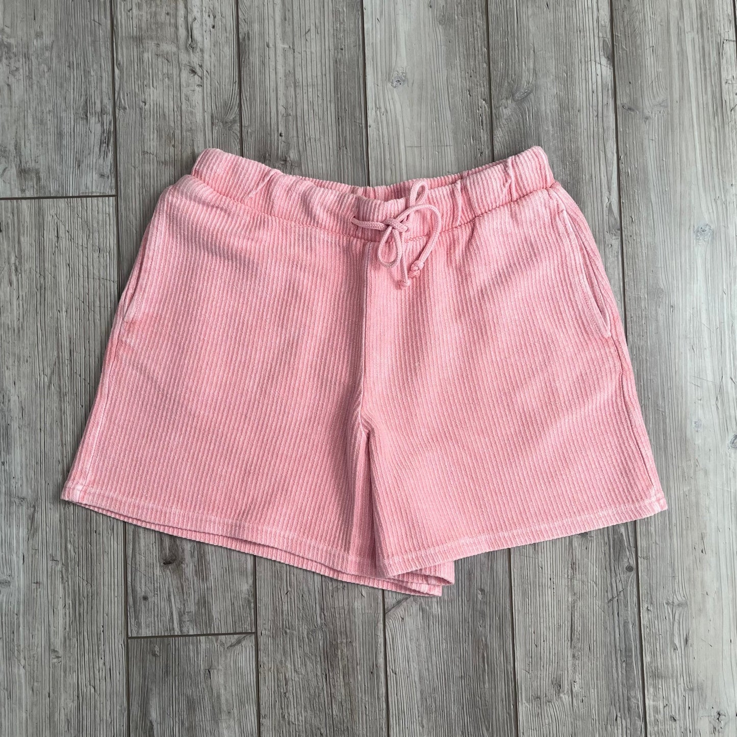 Blossom pink corded shorts by Ivy + Cloth, featuring a breezy and comfortable design, available in sizes S, M, L.