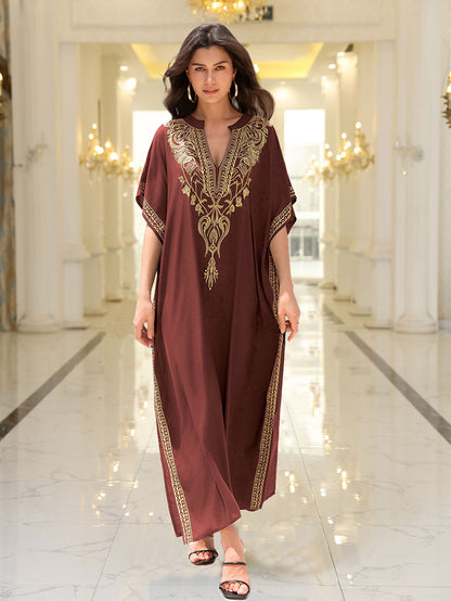 Lightweight black embroidered kaftan beach dress in breathable rayon by Alabaster
