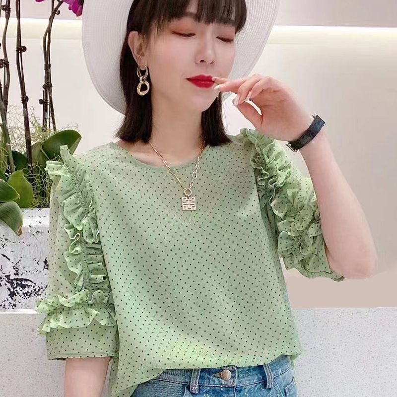Light blue floral chiffon blouse with ruffle sleeves by Alabaster, featuring a lightweight and breathable design.
