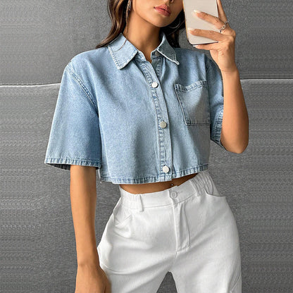Cropped light blue denim shirt by Alabaster, lightweight cotton, button-up style, perfect for casual wear.