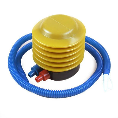 Yellow air pump with blue and red hoses for inflating yoga and exercise balance balls.