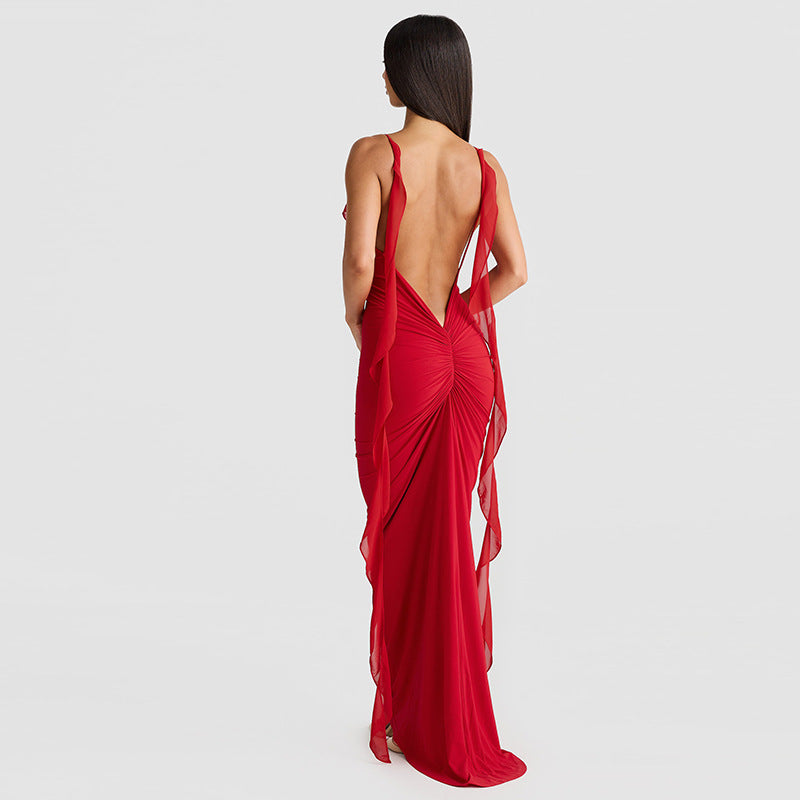 Black elegant suspender dress by Alabaster, curve-hugging design perfect for cocktail events and date nights.