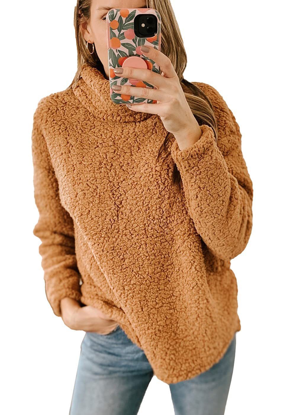 Light gray thick polar fleece turtleneck pullover by Alabaster, featuring a high collar for winter comfort.