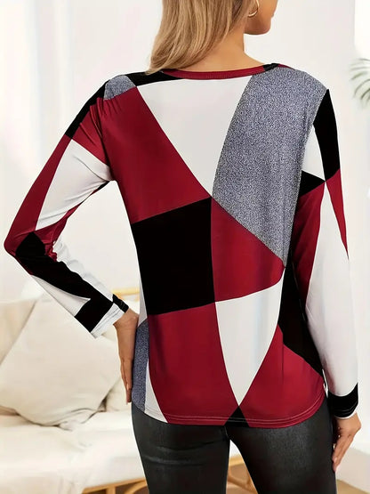 Red, white, and charcoal colorblock long sleeve tee by Alabaster in breathable fabric, available in sizes S, M, L.