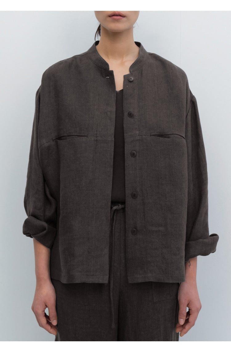 White pure linen pocket shirt by Alabaster, featuring a breathable, casual-elegant design in earthy tones.