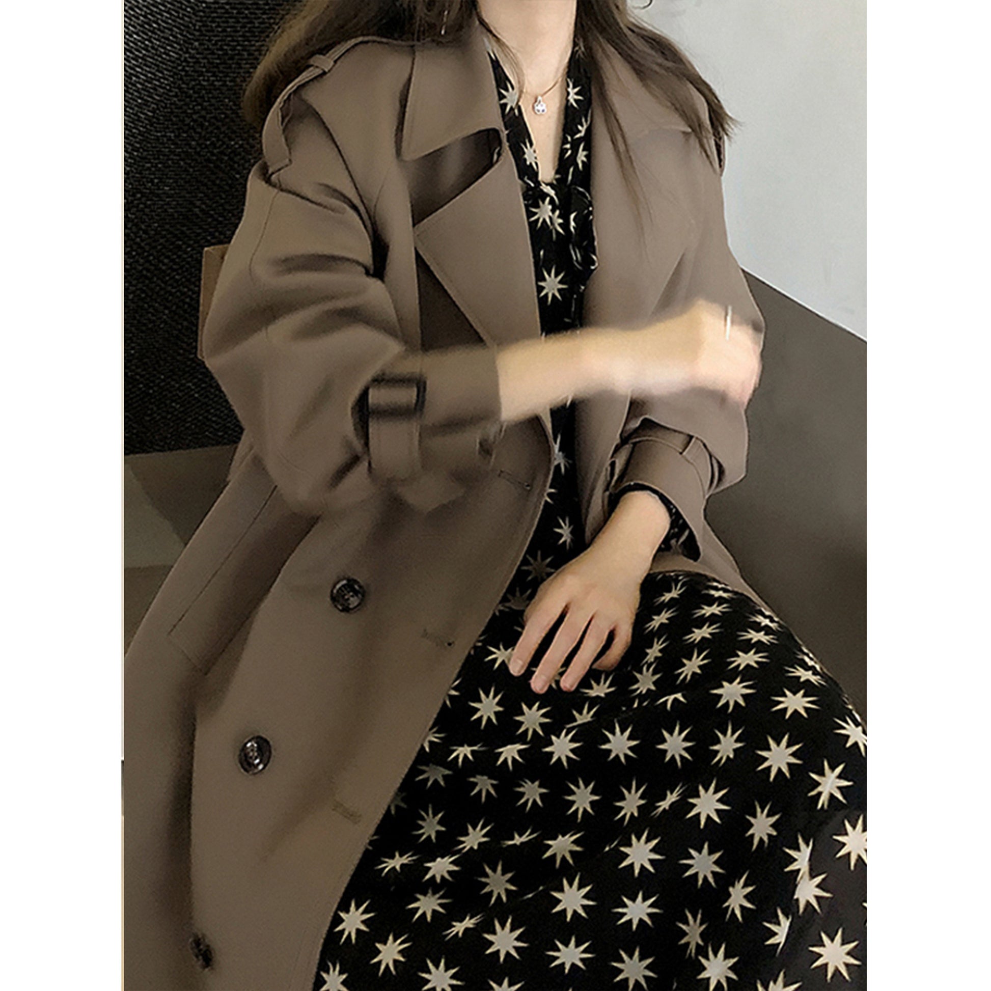 Gray green mid-length oversized trench coat by Alabaster with adjustable cuffs and double-breasted design