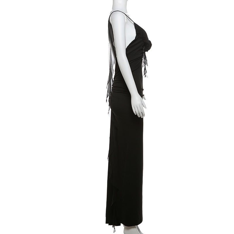 Black elegant suspender dress by Alabaster, curve-hugging design, perfect for cocktail or date night.