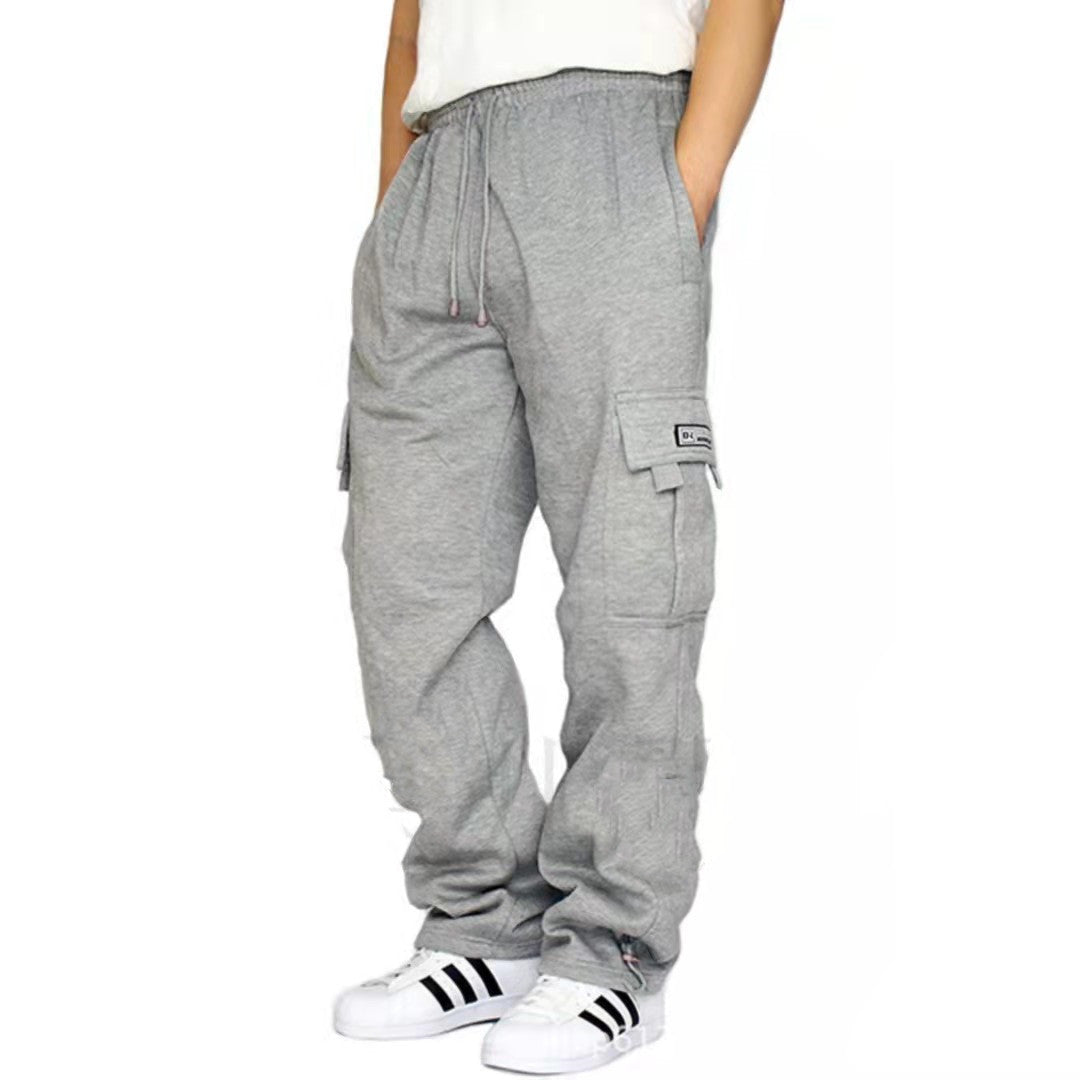 Red elastic waist cargo joggers by My Store, featuring breathable fabric and a casual style.