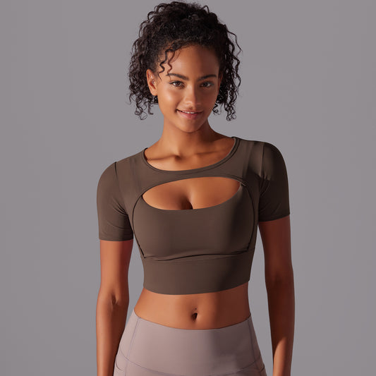 Black mesh double layer cutout sports bra by Alabaster, breathable fitness top with body-hugging fit
